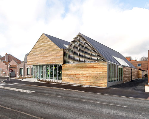 bplusb architectures adds gable-roof to dainville library