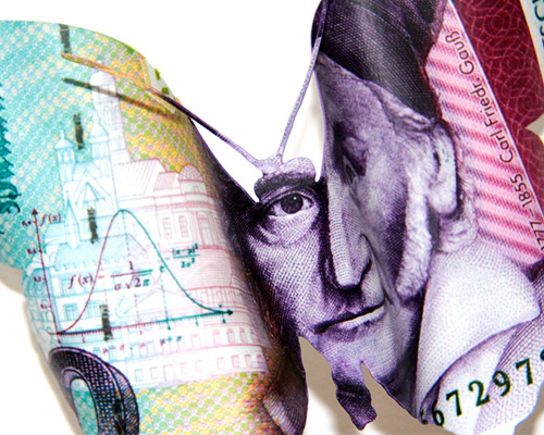 erika harrsch forms delicate currency butterflies from international bills