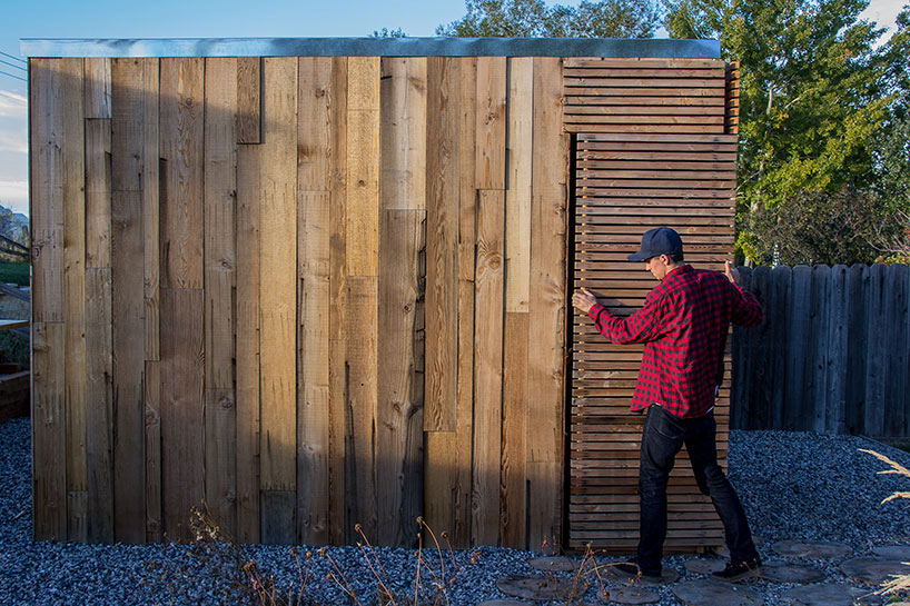 good design collective completes the 2611 green house and fire pit