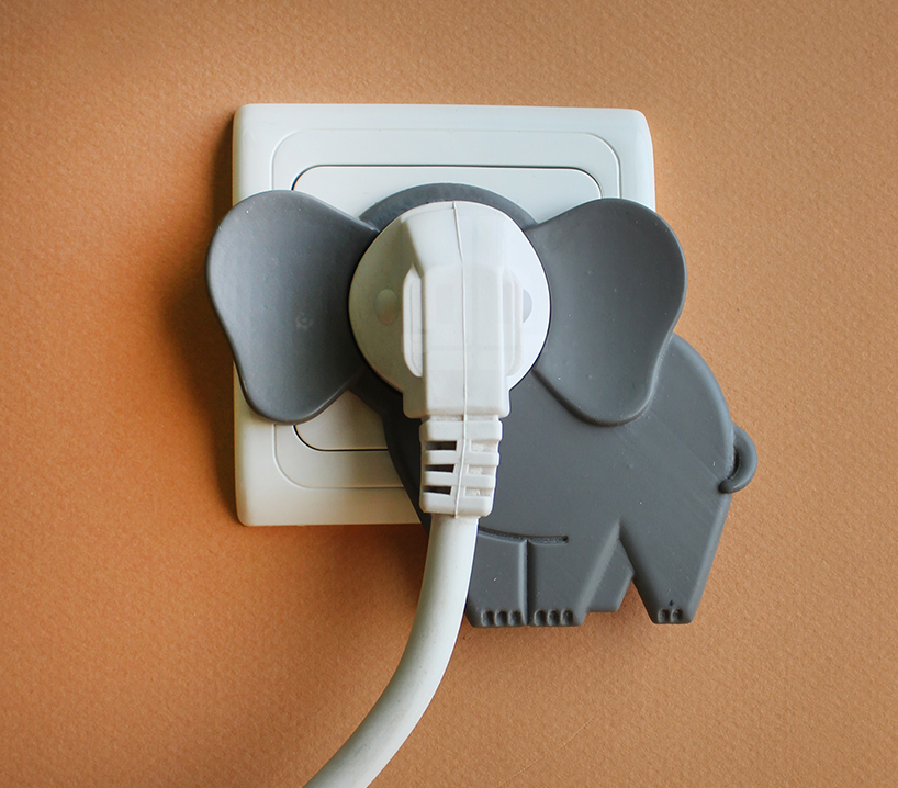 idan noyberg + gal bulka attach elephant in the room onto wall plugs