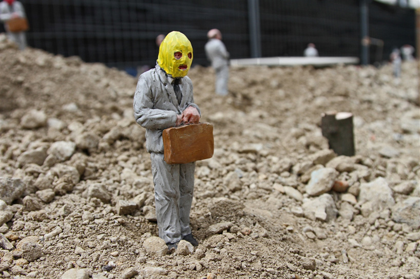isaac cordal miniatures address the collapse of capitalism