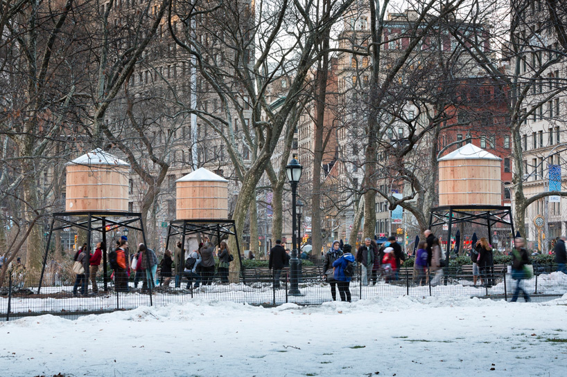 ivan navarro places infinite neons within water tower sculptures