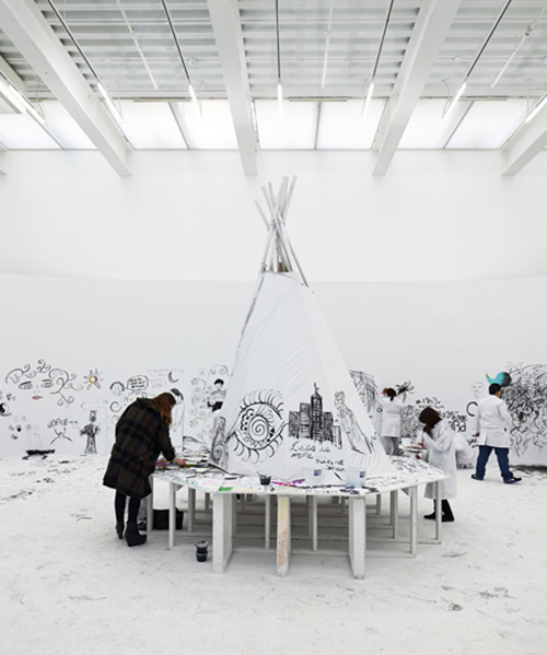 pawel althamer engages visitors with the neighbors at new museum