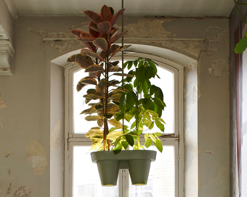 bucketlight tropical plant fixtures by roderick vos incorporates built-in powerstation 