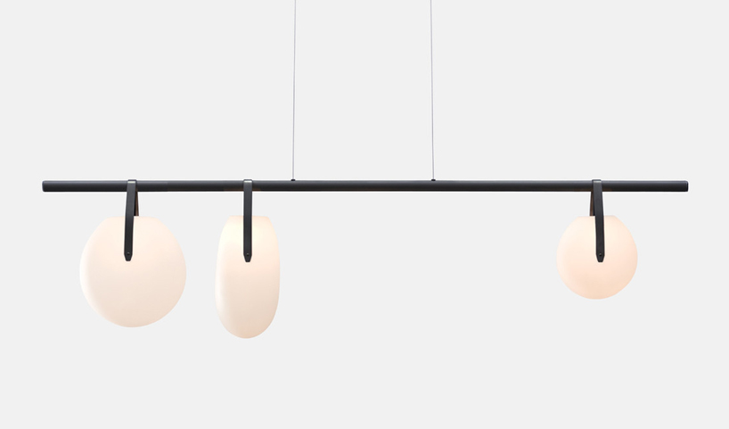 gala LED chandeliers by rich brilliant willing are hand blown with ivory glass