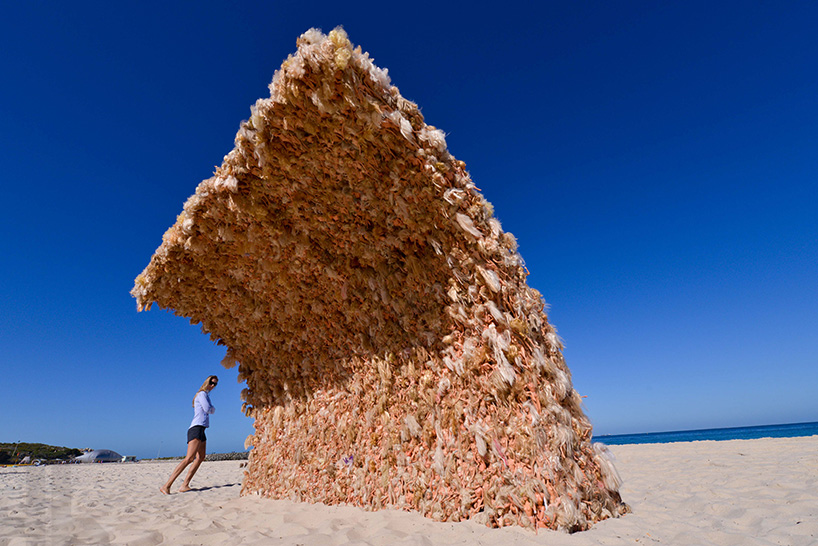 giant barbie wave by annette thas is built from over 3,000 dolls