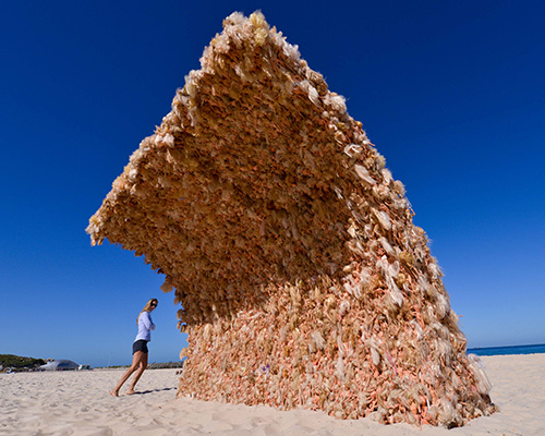giant barbie wave by annette thas is built from over 3,000 dolls