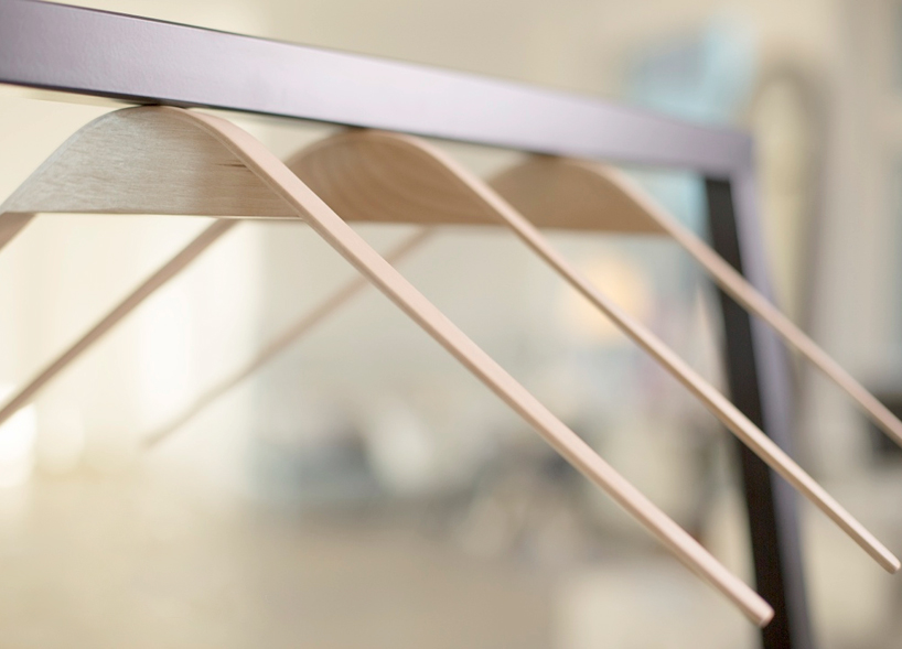 cliq magnetic clothing hangers by flow design eliminates hooks