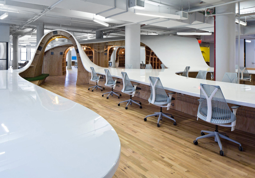 clive wilkinson designs undulating desk for the barbarian group