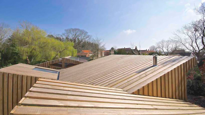 forresterarchitects-wrapped-timber-house-designboom07