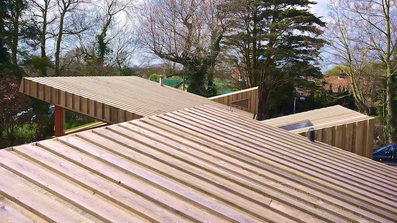 forresterarchitects-wrapped-timber-house-designboom08