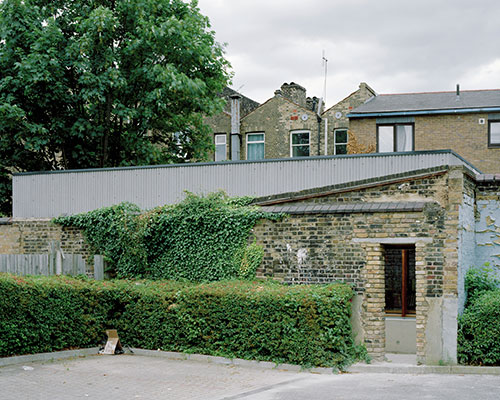 hugh strange completes the strange house and studio in an old pub yard