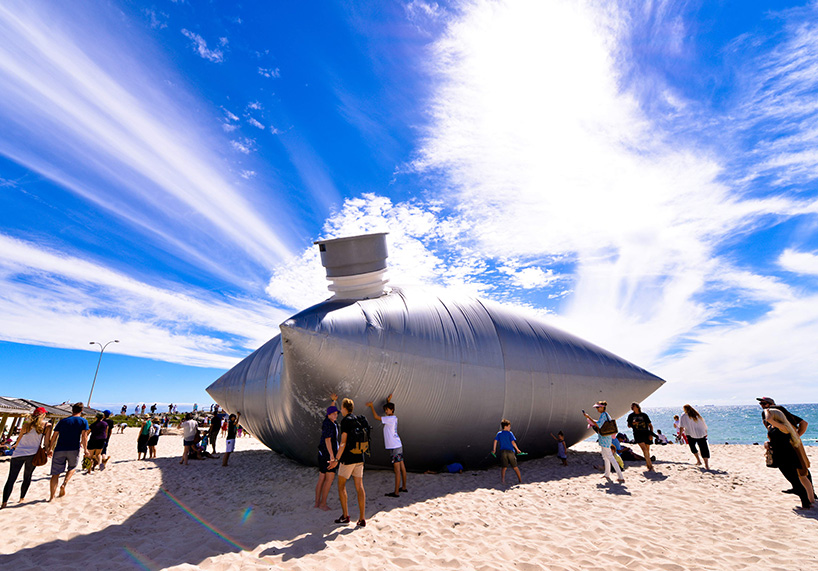 norton flavel inflates massive cask bag on australian beach
