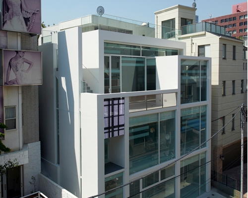 collaged glass facade defines fashion offices by sasaki architecture