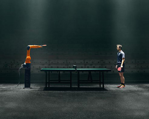 table tennis champion plays against KUKA, fastest robot in the world