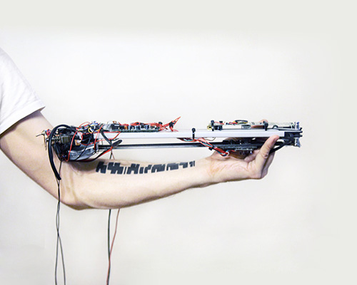 robotic instrument plays tattoos as musical compositions