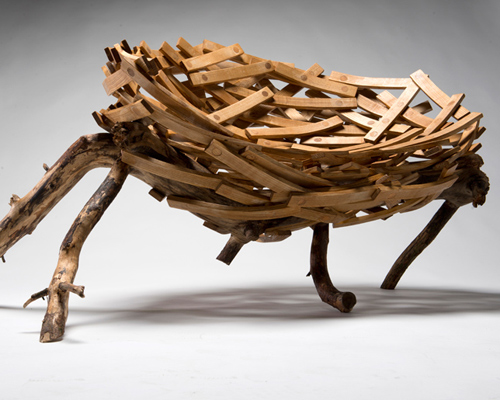 floris wubben shows a nest chair 'eyrie bench' during milan design week