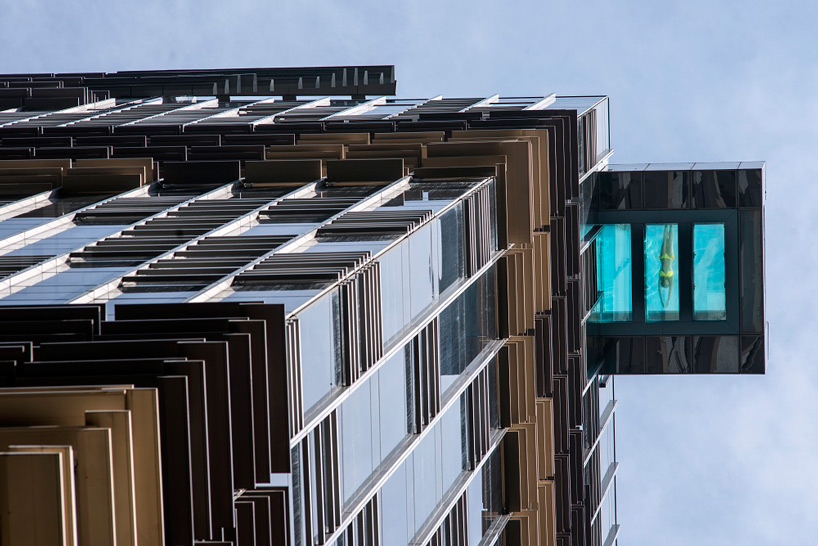 glass pool cantilevers from hong kong's hotel indigo by Aedas
