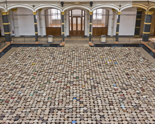 ai weiwei fills berlin's martin-gropius-bau with 6,000 wooden stools