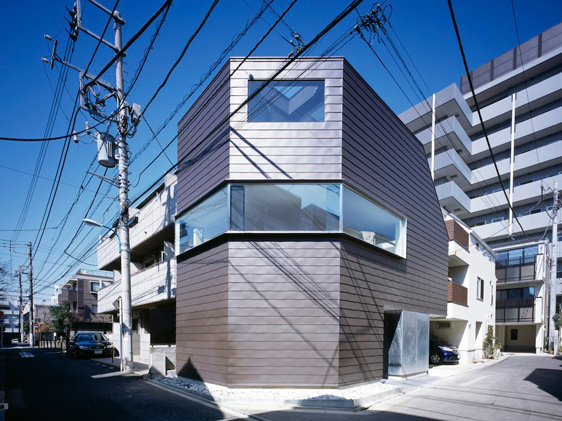 apollo architects clads cave house in galvanized steel