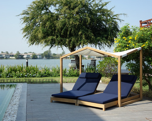 deesawat folds canopy over butterfly lounge bed for two