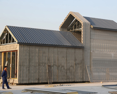 chinese company 3D prints 10 recycled concrete houses in 24 hours