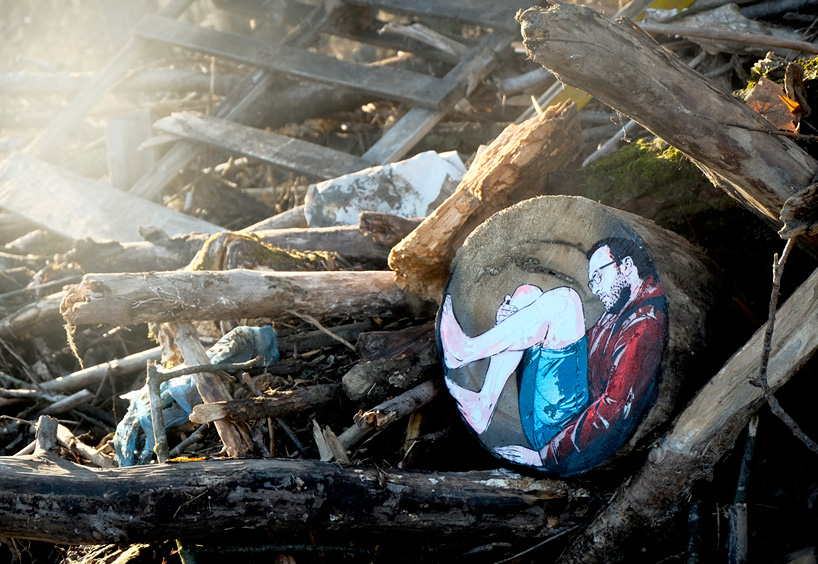 jana & js paint figures enclosed in tree trunk circles