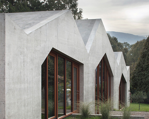 LOCALARCHITECTURE cascades house in confignon down orchard landscape