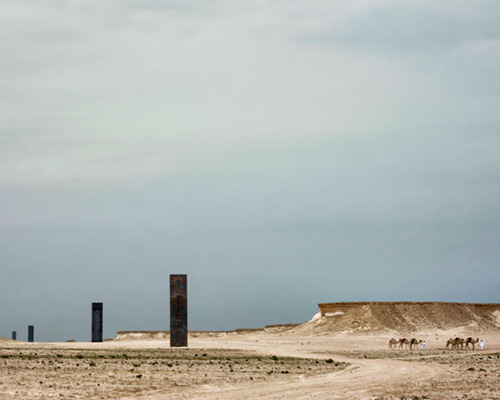 richard serra punctuates qatar's desert landscape with east-west/west-east