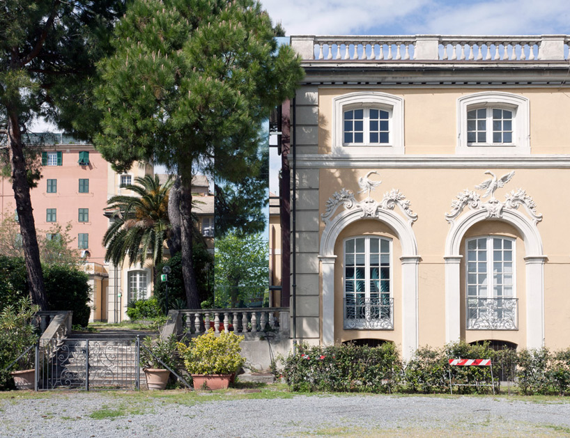 sp10 studio attaches mirrored elevator to italian villa