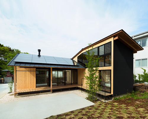 JP architects stretches timber clad qilin house in japan