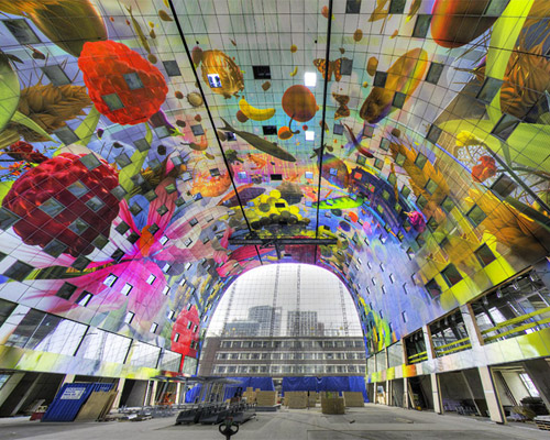 arno coenen + iris roskam wrap rotterdam's markthal in a digital mega-mural