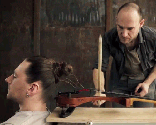tadas maksimovas spins his hair into the playable strings of a violin