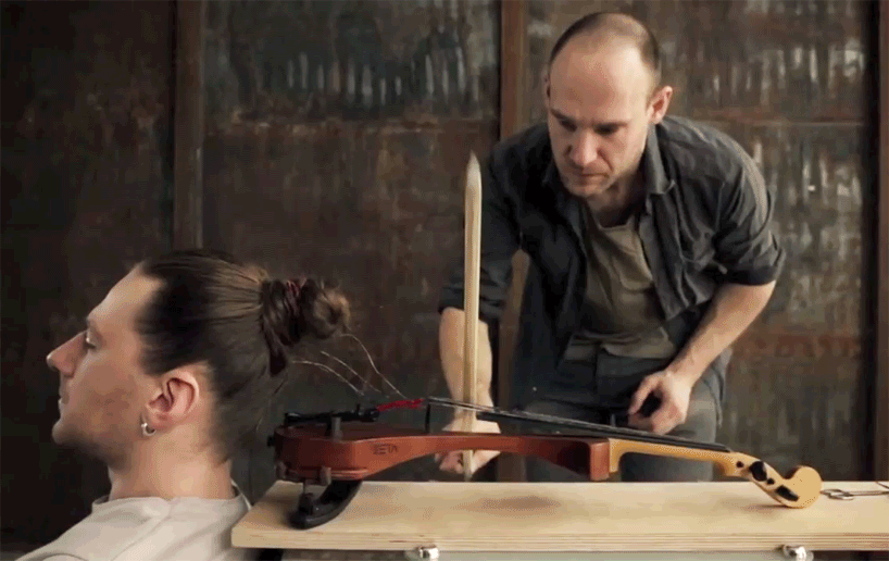 tadas maksimovas transforms his hair into the playable strings of a violin