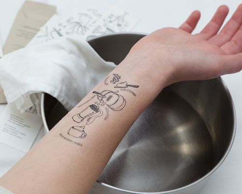 i tradizionali tattoo recipes are applied onto arm for cooking