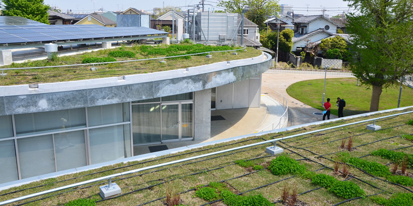 jun aoki sinks omiyamae gymnasium into landscape in tokyo