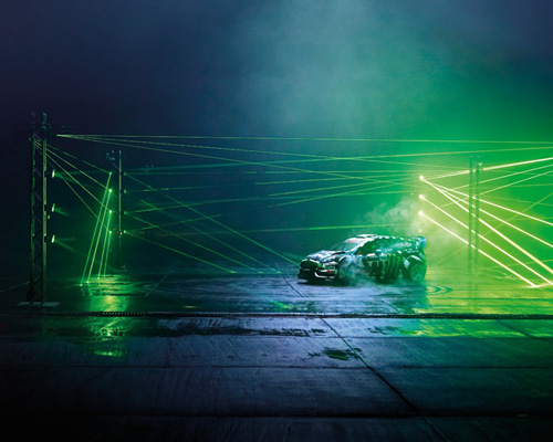 ken block drifts on castrol's pitch-black racetrack with hundreds of lasers