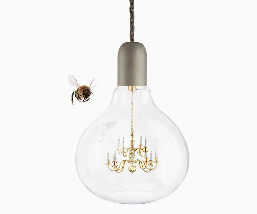 young & battaglia suspends a chandelier inside a lightbulb for mineheart