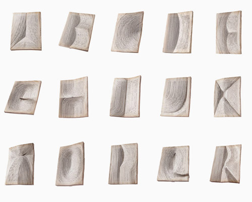 nerhol carves oratorical typeface from layers of japanese books