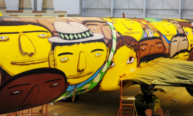 OSGEMEOS graffiti boeing 737 for team brazil's FIFA world cup travel