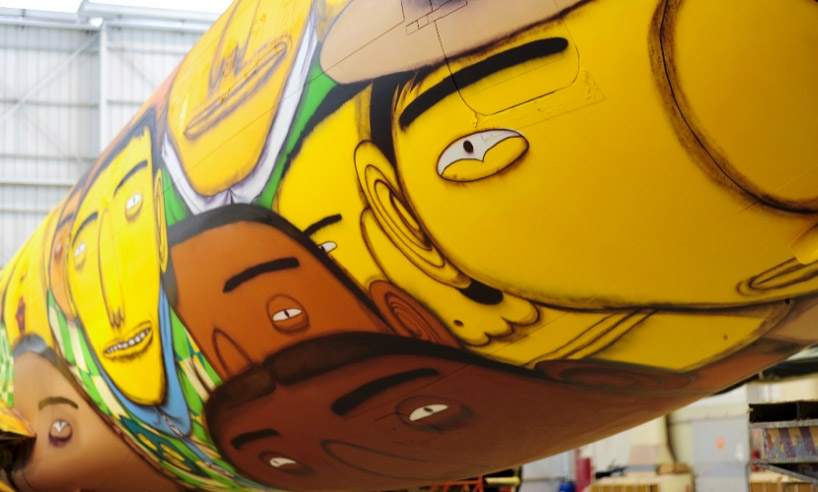 OSGEMEOS graffiti boeing 737 for team brazil's FIFA world cup travel