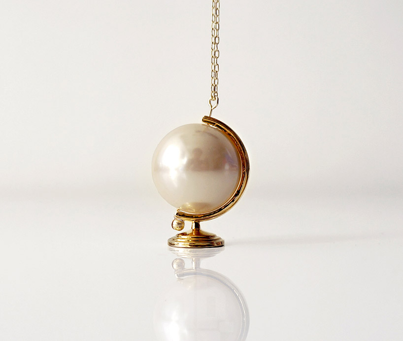 pearl necklaces symbolically reflect the world as your oyster