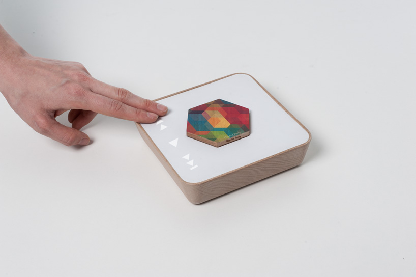 qleek digital wooden hexagons enable music, podcast and playlist sharing