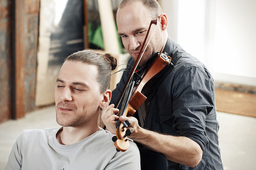 A three string indigenous violin with human hair store for strings