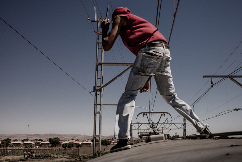 staff riding by marco casino: documenting train surfing in south africa
