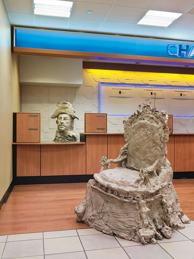 urs fischer exhibits cast bronze sculptures at a former new york bank