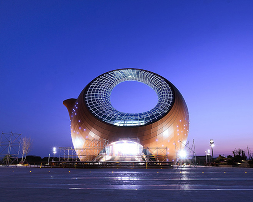 wuxi wanda cultural city's exhibition center resembles giant purple teapot 