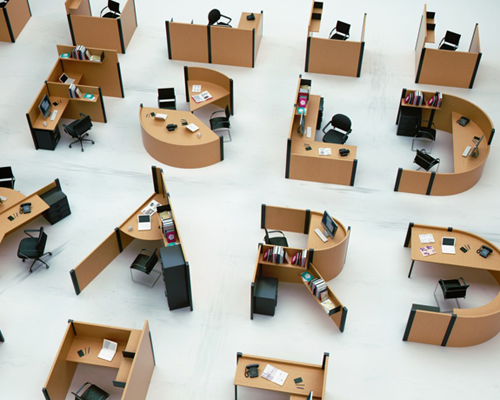 benoit challand spells out an open office with letter desks