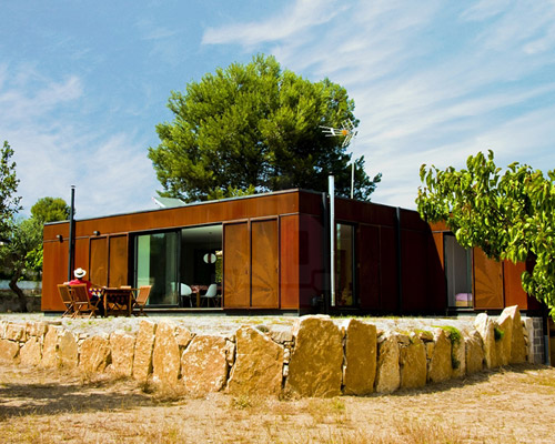 james&mau perforates the facade of casa menta