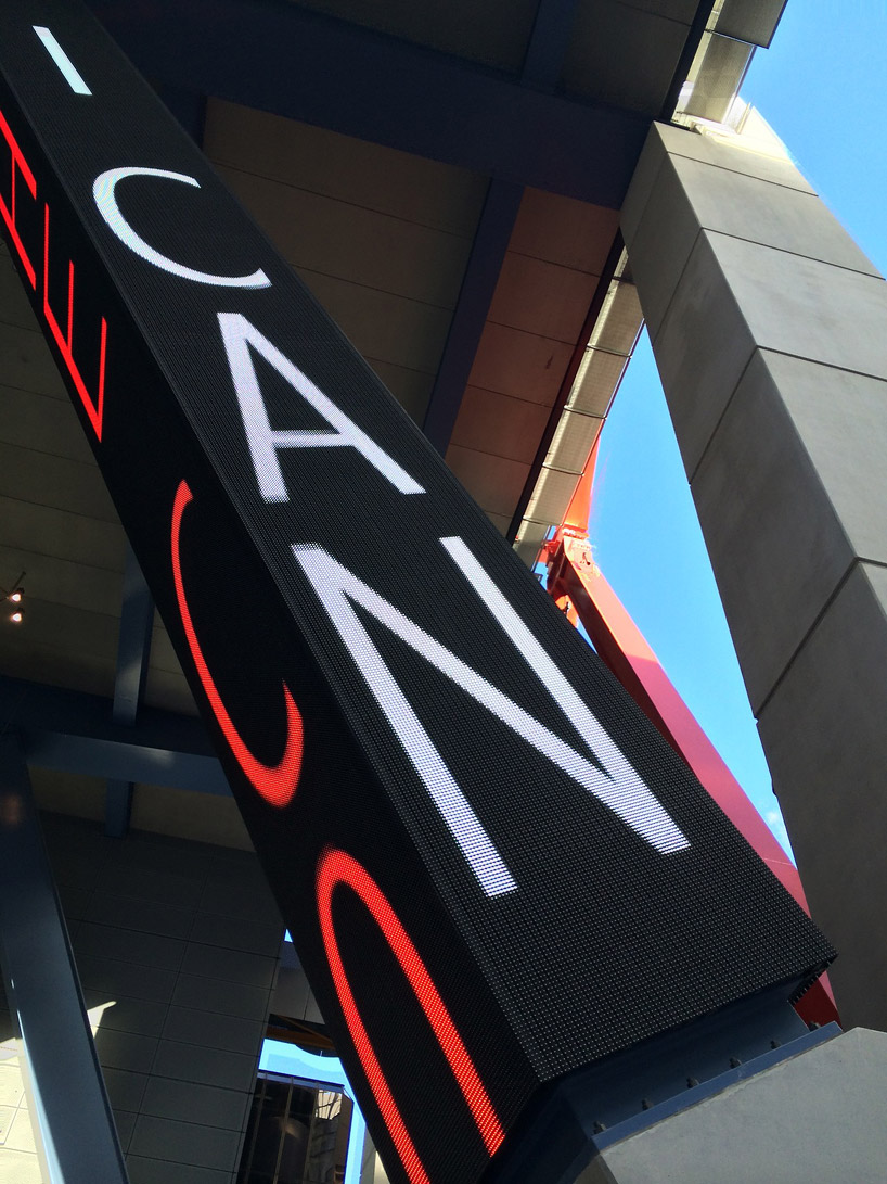 jenny holzer projects poems on 8 chifley square's steel columns in sydney